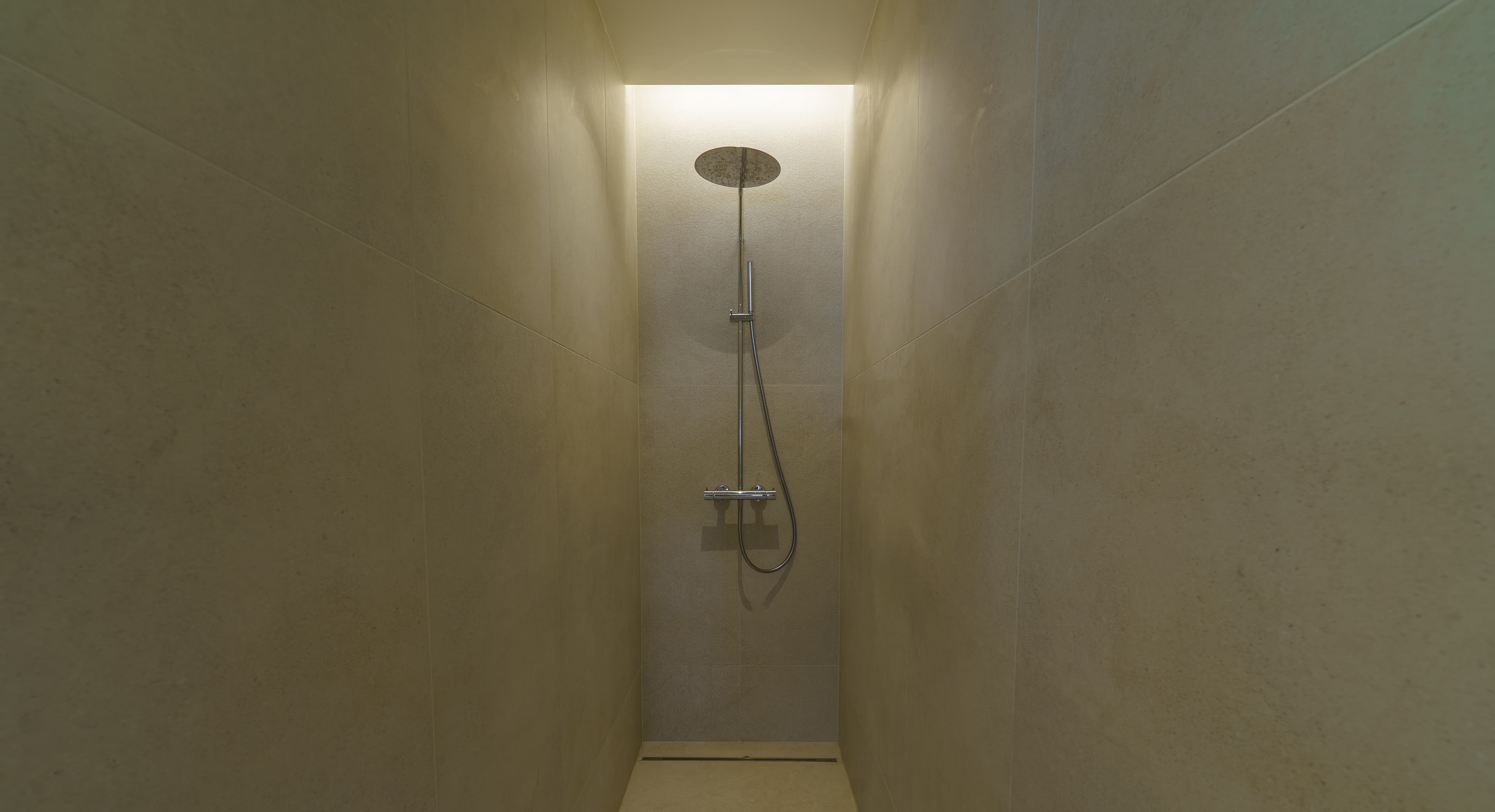 Second-floor en-suite bathroom with a walk-in stone shower