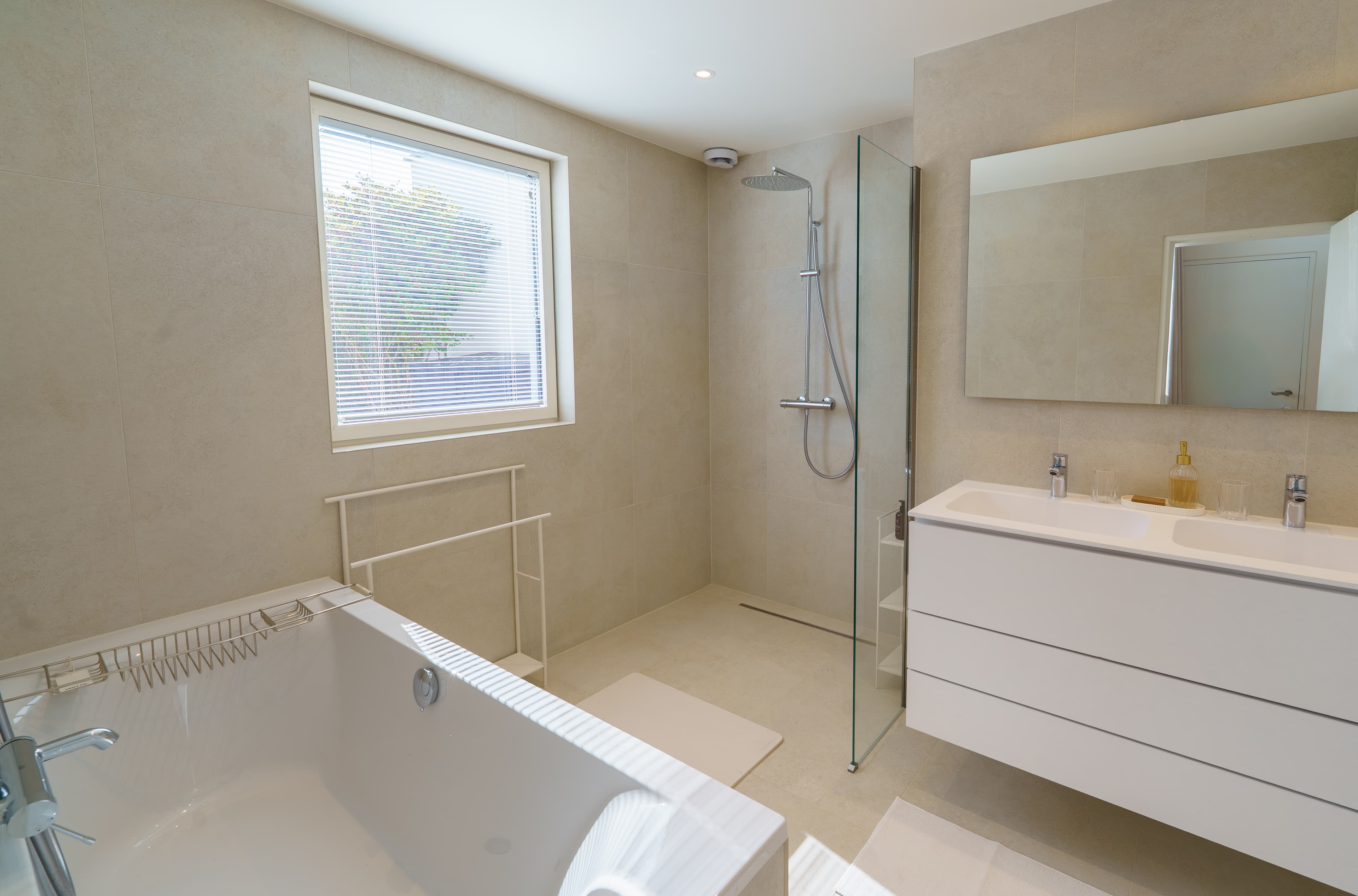 Top-floor en-suite bathroom with a bath, a walk-in shower and a double vanity